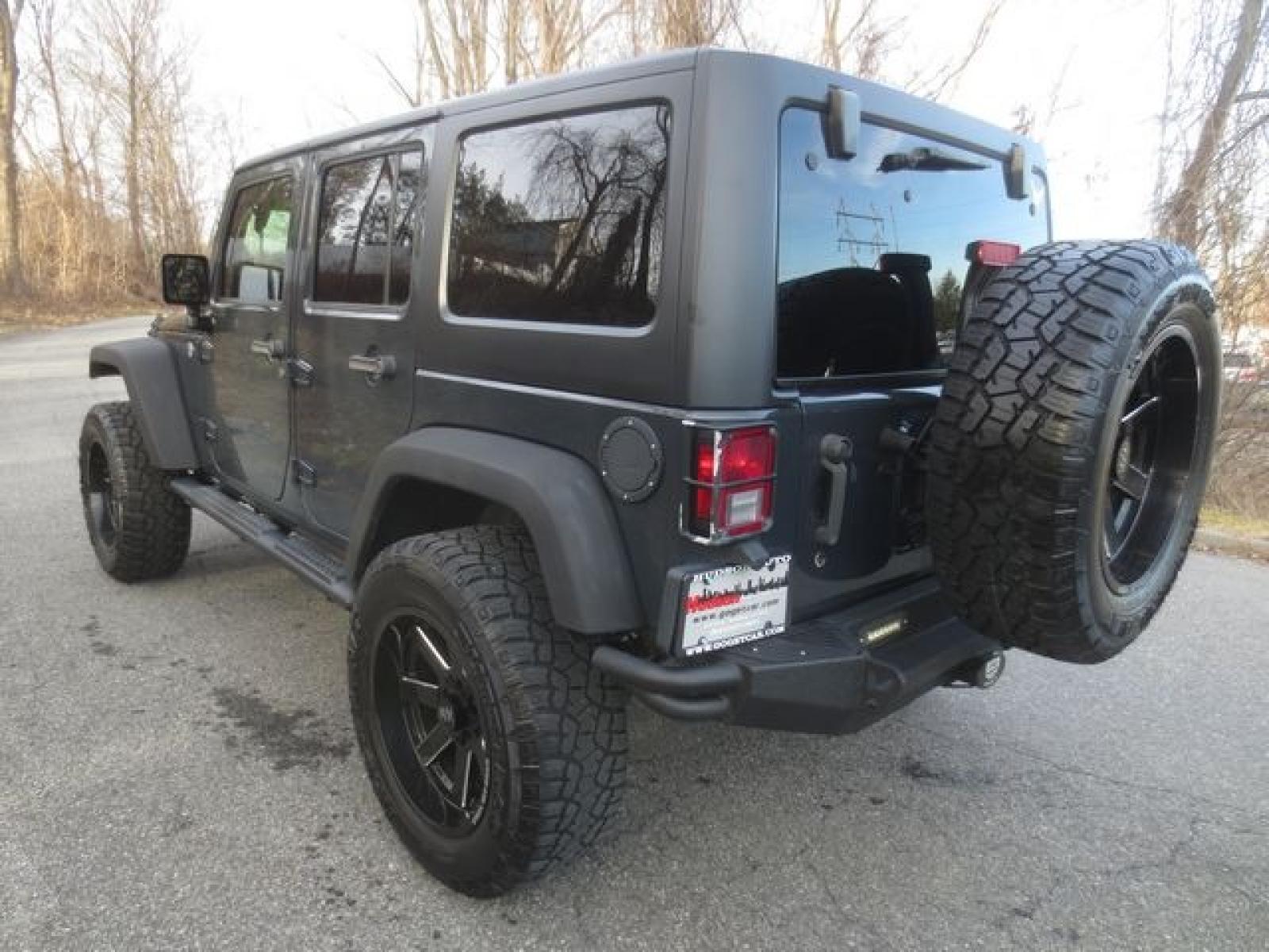2016 Gray /Black Jeep Wrangler Unlimited Sport (1C4BJWDG6GL) with an 3.6 L v6 engine, 6 Speed Manual transmission, located at 270 US Route 6, Mahopac, NY, 10541, (845) 621-0895, 41.349022, -73.755280 - Photo #4